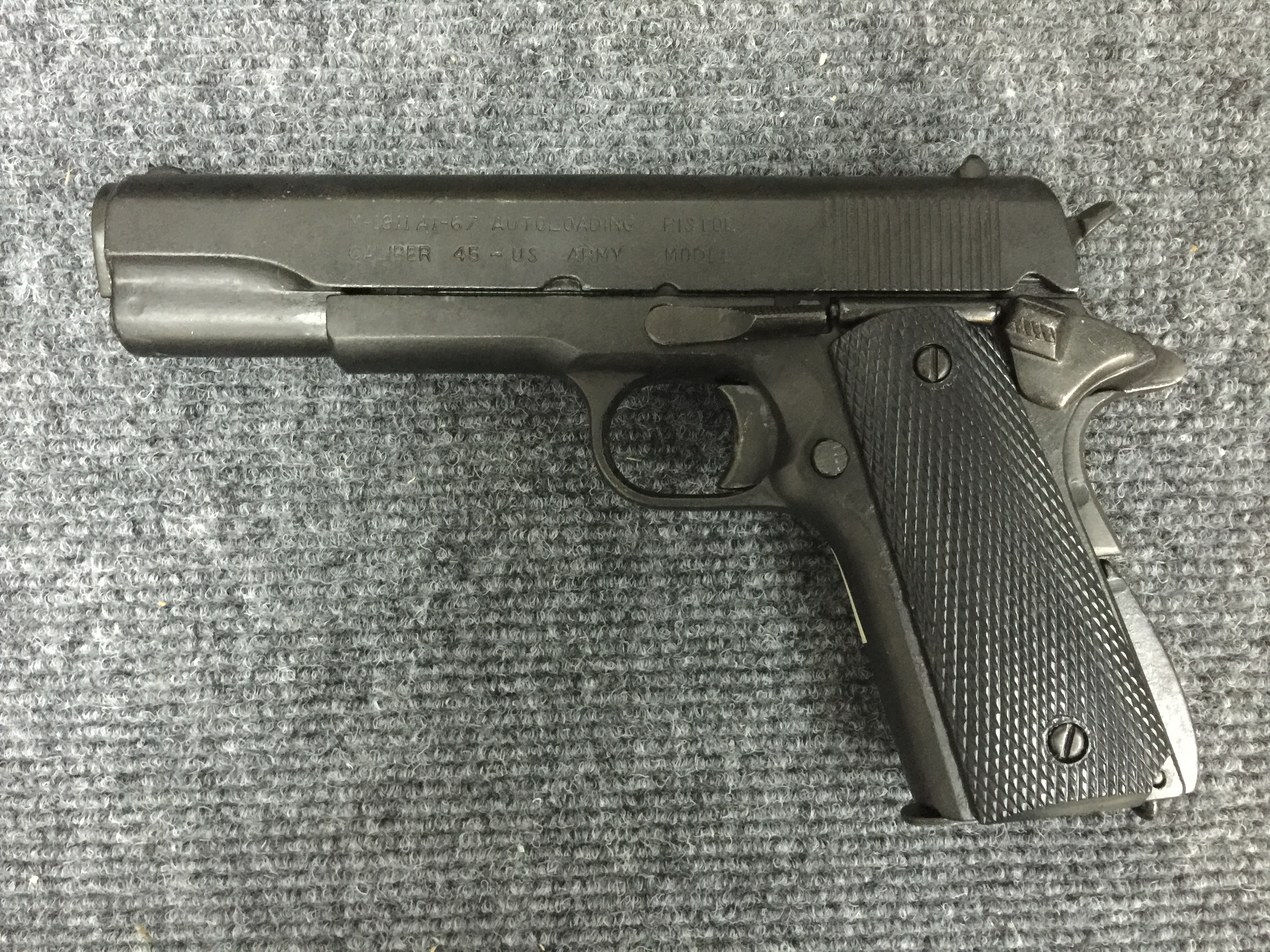 Пистолет Кольт калибр 45